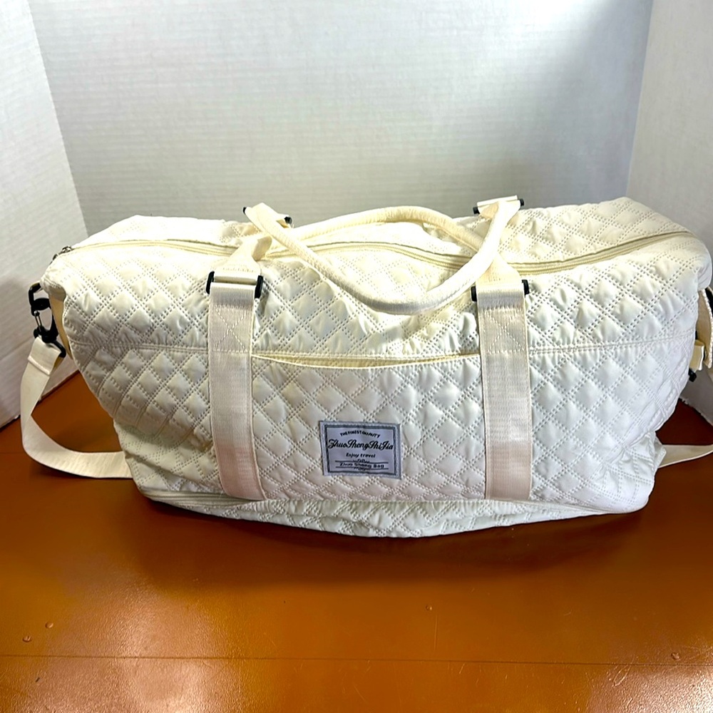 Large cream duffel tote bag